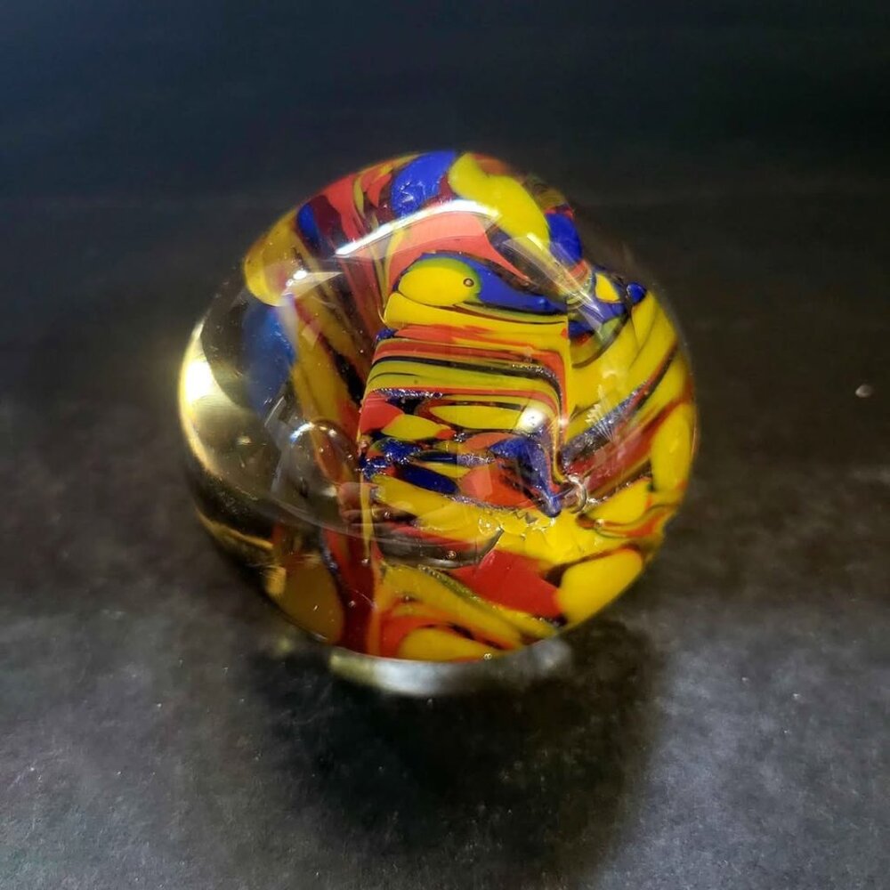 Collectible Glass Paperweight Featuring A Multicolored Swirling